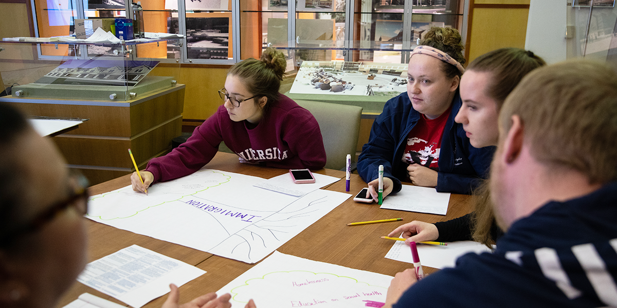 Students in a group working together